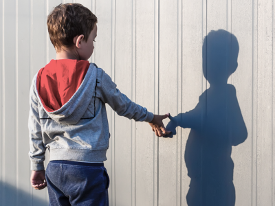 Picture of child looking at his shadow